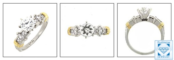 Two tone gold ring with round center stone/marquise and princess cut cz