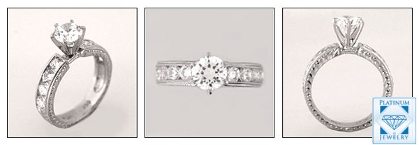 Diamond quality round cz engagement ring in hand engraved platinum setting 