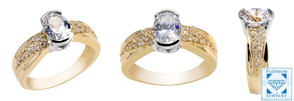 Two tone ring with oval cubic zirconia