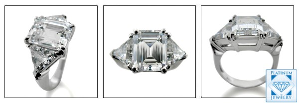CUBIC ZIRCONIA 4.5 CARAT EMERALD CUT WITH TRILLIONS 3 STONE RING