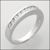 WHITE GOLD WEDDING BAND WITH CHANNEL SET ROUND CZ STONES
