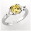 CANARY ROUND CZ 3 STONE PLATINUM RING WITH TRILLIONS 