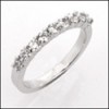 .50 CTW CUBIC ZIRCONIA WEDDING BAND/ SHARE PRONG