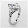 3 Stone Marquise And Trillion Cut Cz ring in 14k white gold