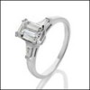 0.75 EMERALD CUT CZ AND TAPERED BAGUETTE ENGAGEMENT RING