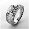 Channel set emerald cut cz band in 14k white gold