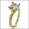 1.5  PRINCESS AND BAGUETTE CUBIC ZIRCONIA YELLOW GOLD RING
