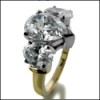 1.5 HIGH QUALITY PEAR CZ CENTER WITH OVALS  TWO TONE GOLD 3 STONE RING