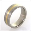 Titanium wedding band with wide stripe of gold