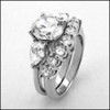 1.75 round CZ with pear Sides Matching engagement ring set