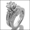 1.0 carat Round CZ in Platinum engagement ring set 