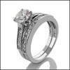 Platinum engament ring and a matching band with 1 Carat cubic zirconia