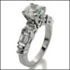 PLATINUM ENGAGEMENT RING WITH CZ ROUND AND BAGUETTE STONES